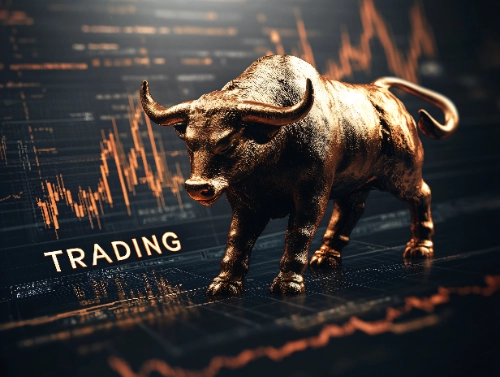 Una estatua dorada de un toro en postura de embestida sobre un fondo oscuro con gráficos financieros y la palabra "TRADING", simbolizando un mercado alcista.